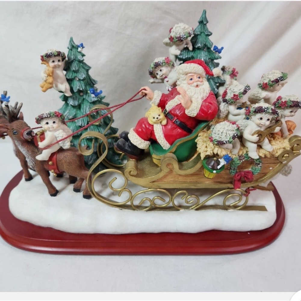 Festive Santa's Sleigh w/Reindeer &Elves
BoxedStyrofoam liner measuring 15x11x11
